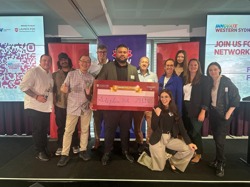 Stephen Neli and the Spacecubed community with the pitch prize at Innovate Western Sydney 