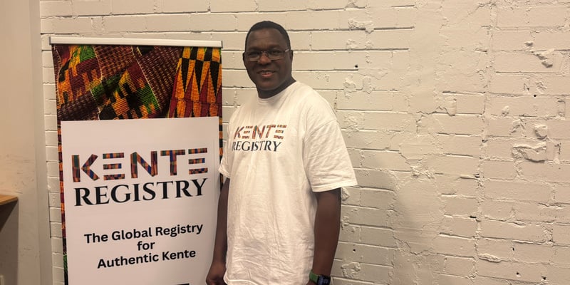 Kente Registry founder Phillip with Kente cloth, bringing Ghanaian cultural heritage to Perth