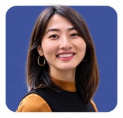 Warm Smiling Woman in Blue Portrait