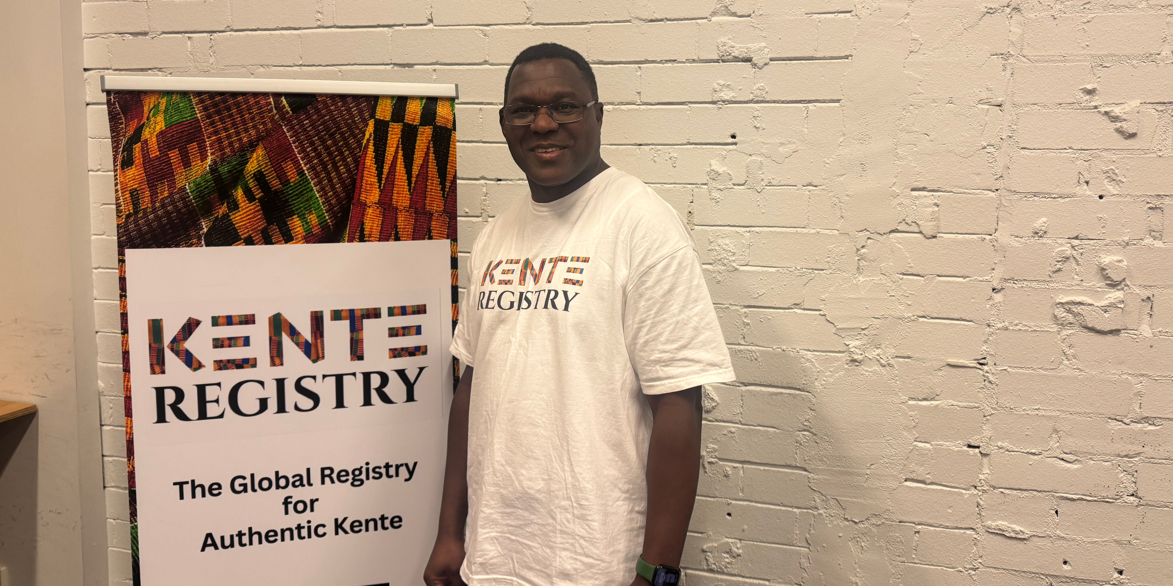 Kente Registry founder Phillip with Kente cloth, bringing Ghanaian cultural heritage to Perth